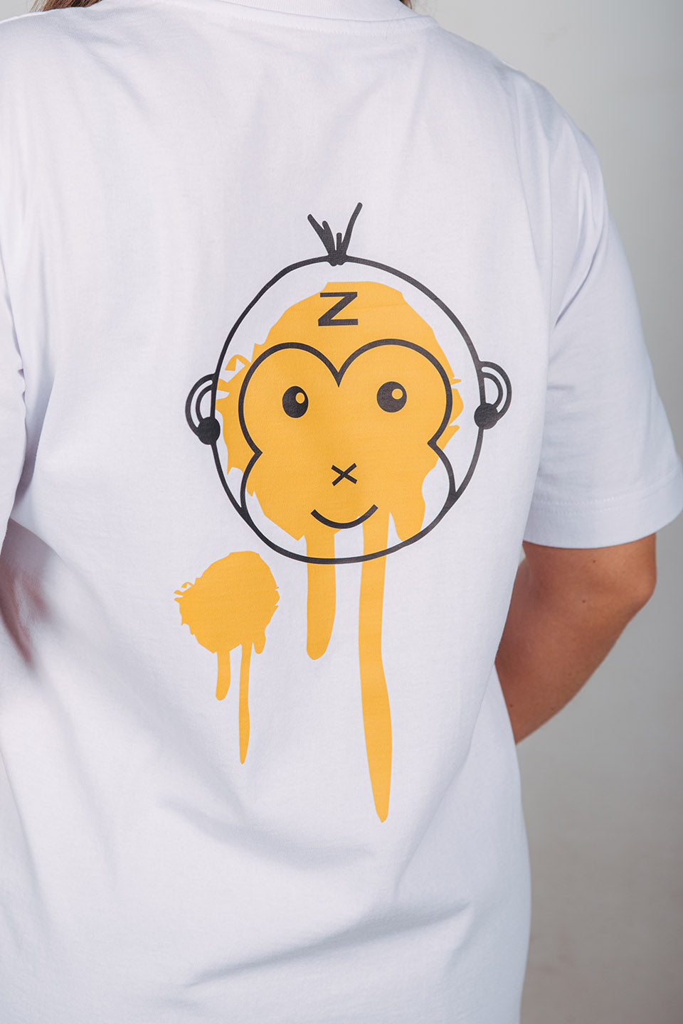 Zengange Premium – White colored T-shirt with orange details.